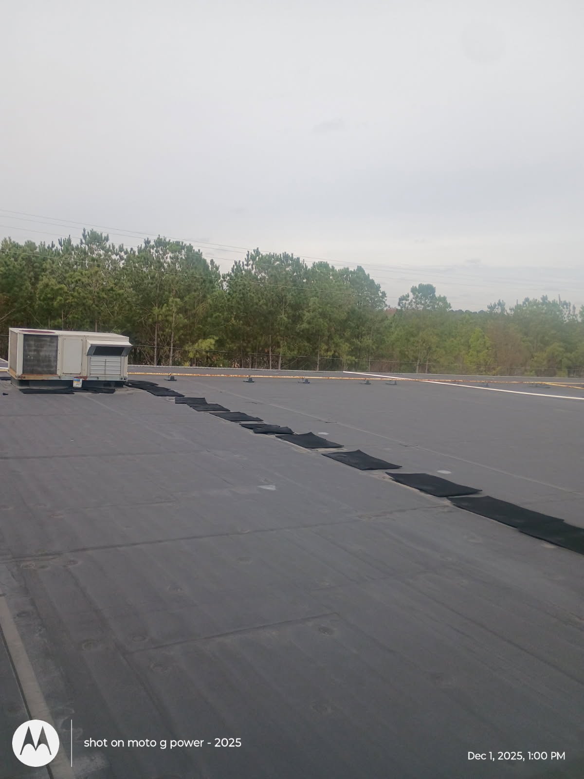 Roofing crew work area during repair service